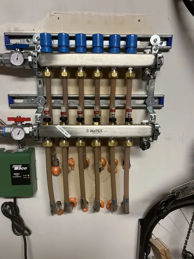 Plumber performing Gas Leak Detection at a residential property in Livingston